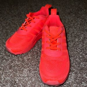 Toddler boy, stripe life turbo slip on Adidas tennis shoes.